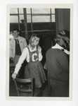 A photo of a blonde Conway High School cheerleader eating a lollipop by Lonnie W. Fleming Sr.