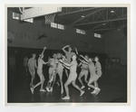 A photo of a group of boys playing basketball in the Conway High School gymnasium by Lonnie W. Fleming Sr.