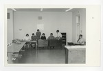 A photo of a group of students hanging out and studying in a study room at Conway High School by Lonnie W. Fleming Sr.