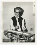 A photo of a woman holding a Baritone by Lonnie W. Fleming Sr.