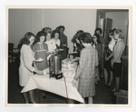 A photo of girls in line for cake and coffee by Lonnie W. Fleming Sr.