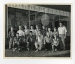 A photo of a group of kids wearing medals and posing for a picture by Lonnie W. Fleming Sr.