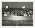 Two rows of elderly people in a church by Lonnie W. Fleming Sr.