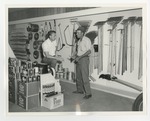 Two men inside the FCX Service store by Lonnie W. Fleming Sr.