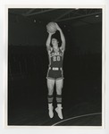 A male basketball player about to throw a basketball by Lonnie W. Fleming Sr.