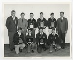 A small class of boys wearing vocational agriculture jackets and holding FFA plaques by Lonnie W. Fleming Sr.