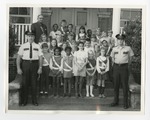 A photo of a class of students wearing deputy badges by Lonnie W. Fleming Sr.