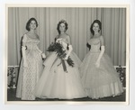Three women in dresses by Lonnie W. Fleming Sr.