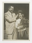 A suited gentleman crowning a cheerleader by Lonnie W. Fleming Sr.