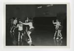A PE class in which the girls are playing basketball by Lonnie W. Fleming Sr.