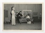 The same play but a boy is now standing and bowing to a lady sitting on a couch by Lonnie W. Fleming Sr.