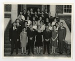 A group of well-dressed adults on the steps of Conway High School by Lonnie W. Fleming Sr.