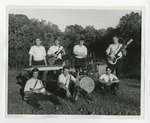 The same jazz band taking a group picture on a green by Lonnie W. Fleming Sr.