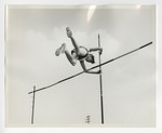 A male athlete pole vaulting by Lonnie W. Fleming Sr.