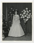 Miss South Carolina standing beside flowers by Lonnie W. Fleming Sr.