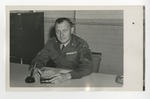 A military official at his desk by Lonnie W. Fleming Sr.