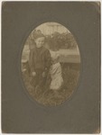 Young boy standing near a baby by Horry County Historical Society
