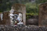 Small Ceramic Angels on the Graves 2 by Emily Munn