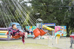 Kid on a Swing at Penn Center Heritage Days by Nicklaus McKinney